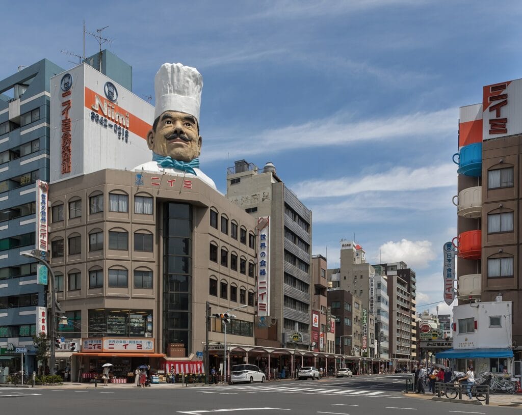 Street corner at the southern end of Kappabashi-dori, Tokyo's kitchenware district, on a sunny morning
