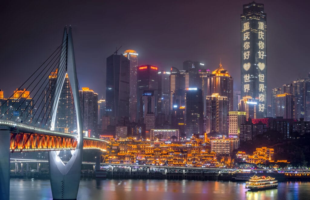 Night view of Chongqing with Qiansimen Bridge, Hongyadong and the skyline lit up over the Jialing River